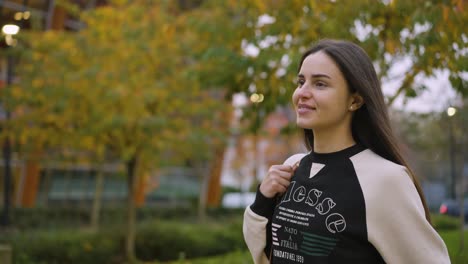 a woman excited and happy to to the gym.