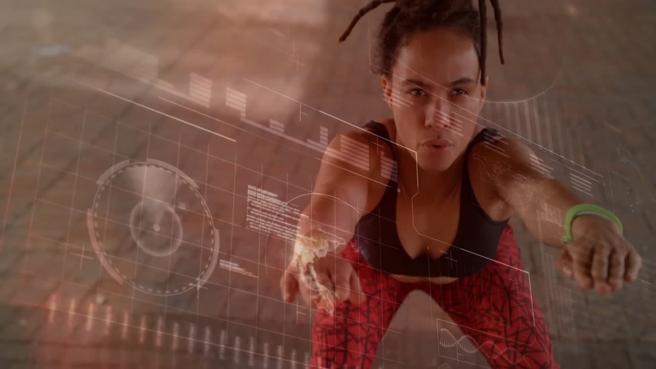 Female athlete squatting over tiled plaza, reaching into transparent holographic fitness charts