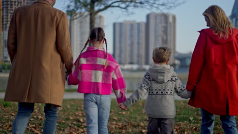 family walking together in the park
