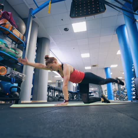Fit woman exercising indoors