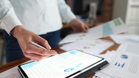 businesswoman examines business charts at workplace slow motion 4k movie