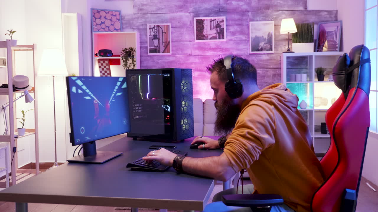 Man Playing Video Games on Computer