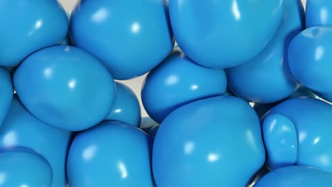 abstract colorful blue squishy balls move and interact with each other with internal pressure trying to find a place for themselves.