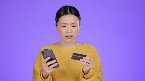 Upset,-phone-and-shocked-woman-with-credit-card