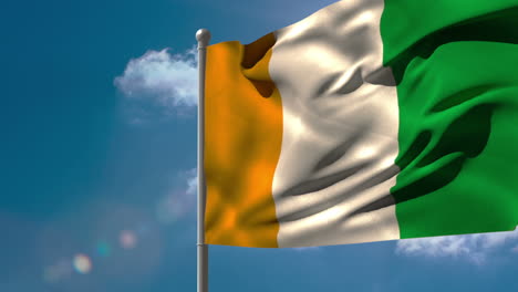 ivory coast national flag waving on flagpole