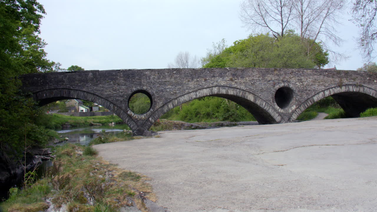Extra Wide shot of Cenarth bridge at Cenarth Falls on the river Teifi
