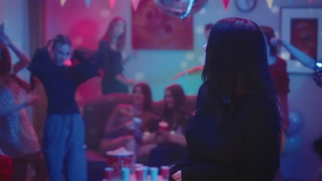 teen girl at a party feeling excluded