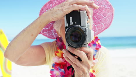 senior woman taking picture