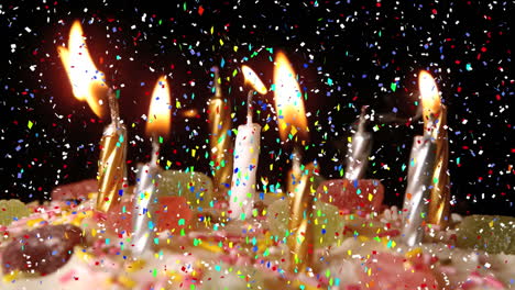 animación de confeti multicolor cayendo sobre pastel de cumpleaños con velas