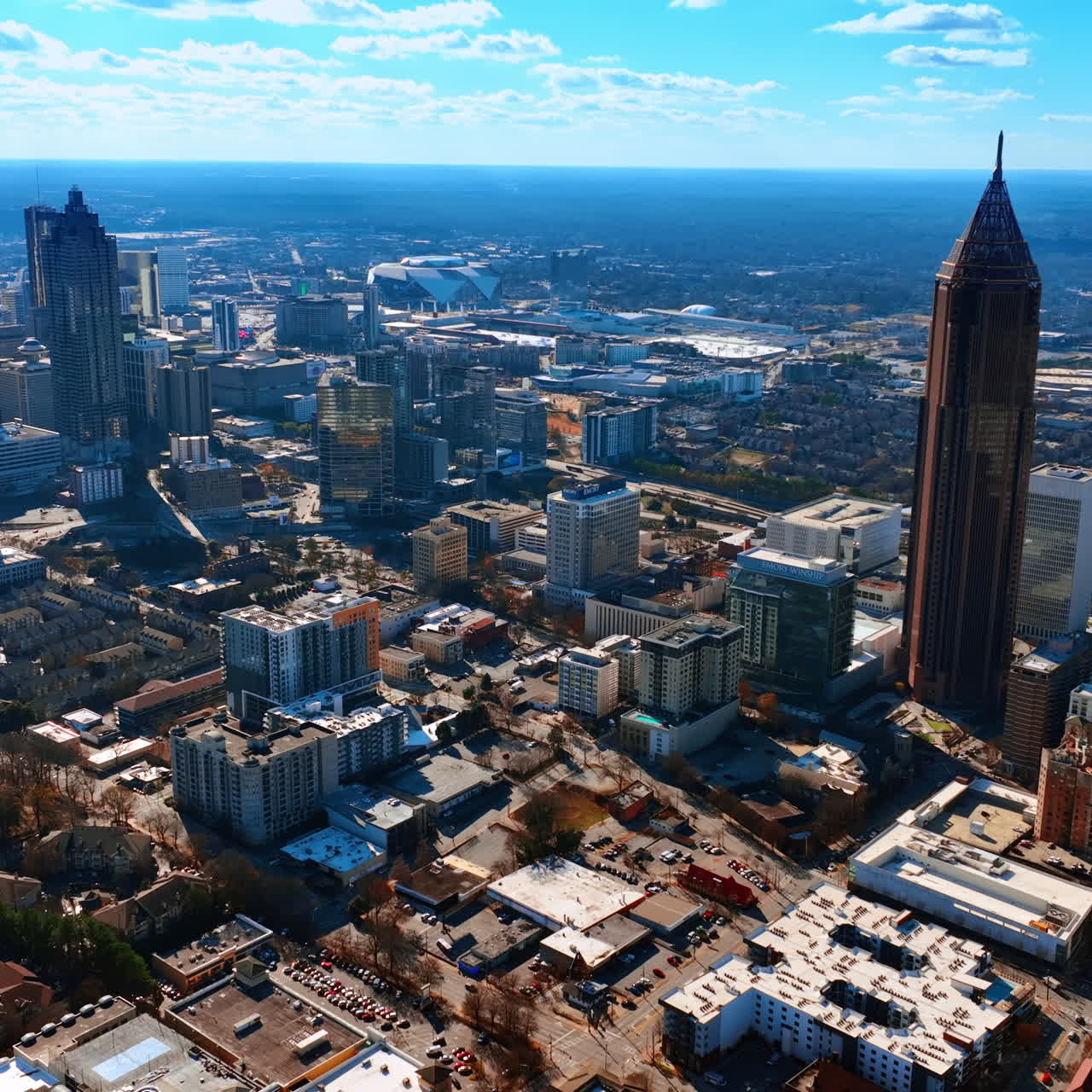 Vast scenic view of Atlanta, Georgia, USA. Beautiful cityscape of the metropolis from drone footage.