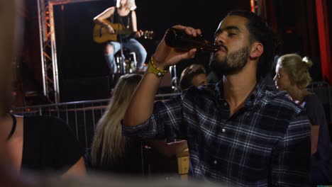 man drinking beer