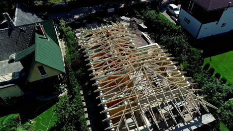 under construction house in middle of a nicely organized neighborhood