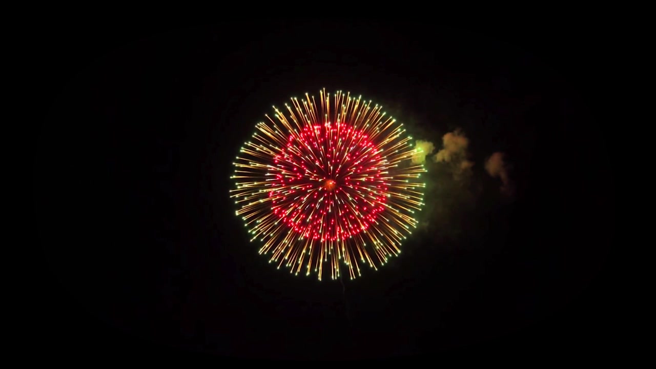 Fuochi d'artificio astratti, realistici e colorati, animazione in loop 4K, particelle di esplosione di scintille magiche