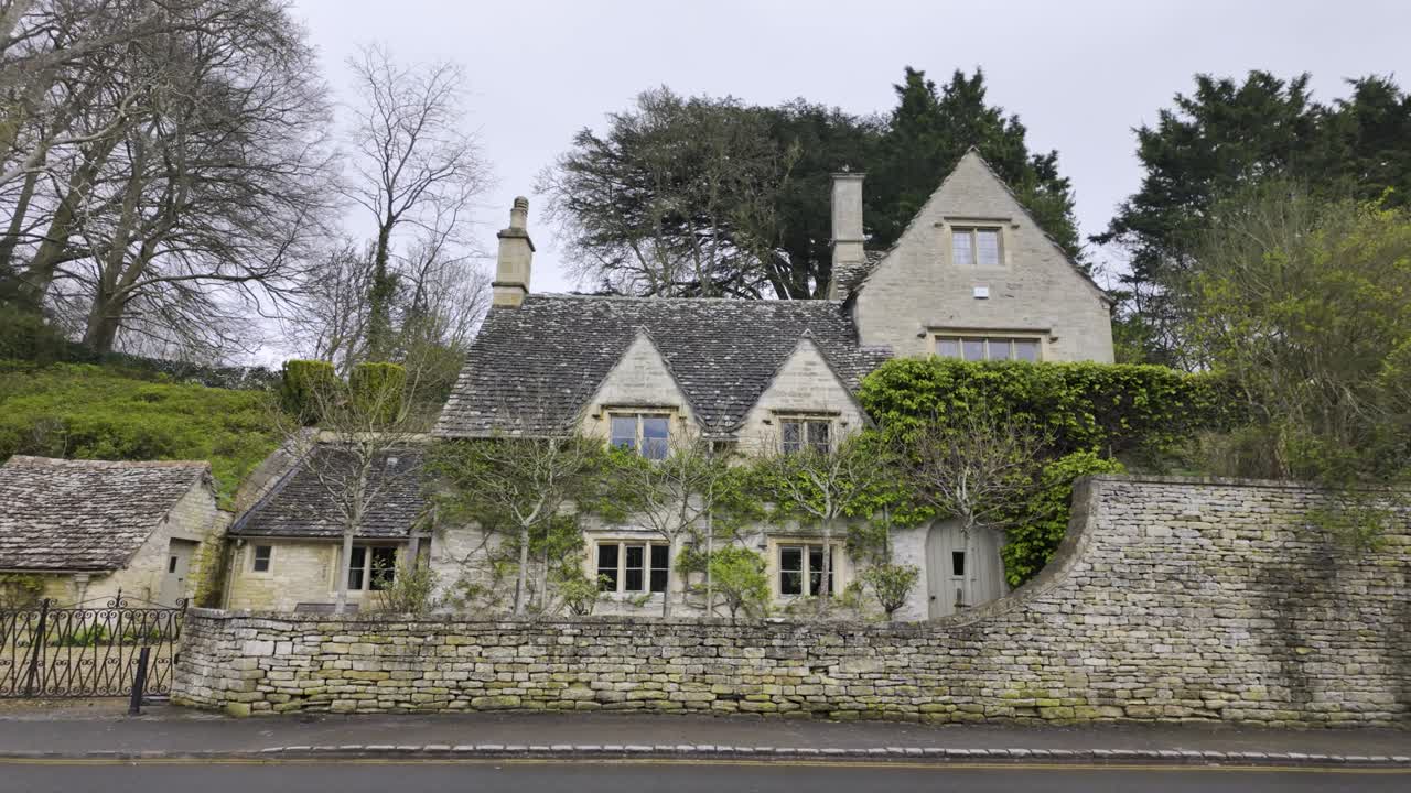 Old and preserved House at the main Street in Bibury, Cotswolds, England, United Kingdom - March 2024
