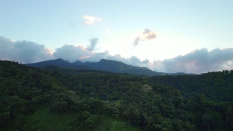 glowing sky, mountains and jungle of guadeloupe, aerial view