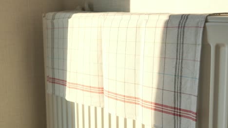 towels drying on radiator