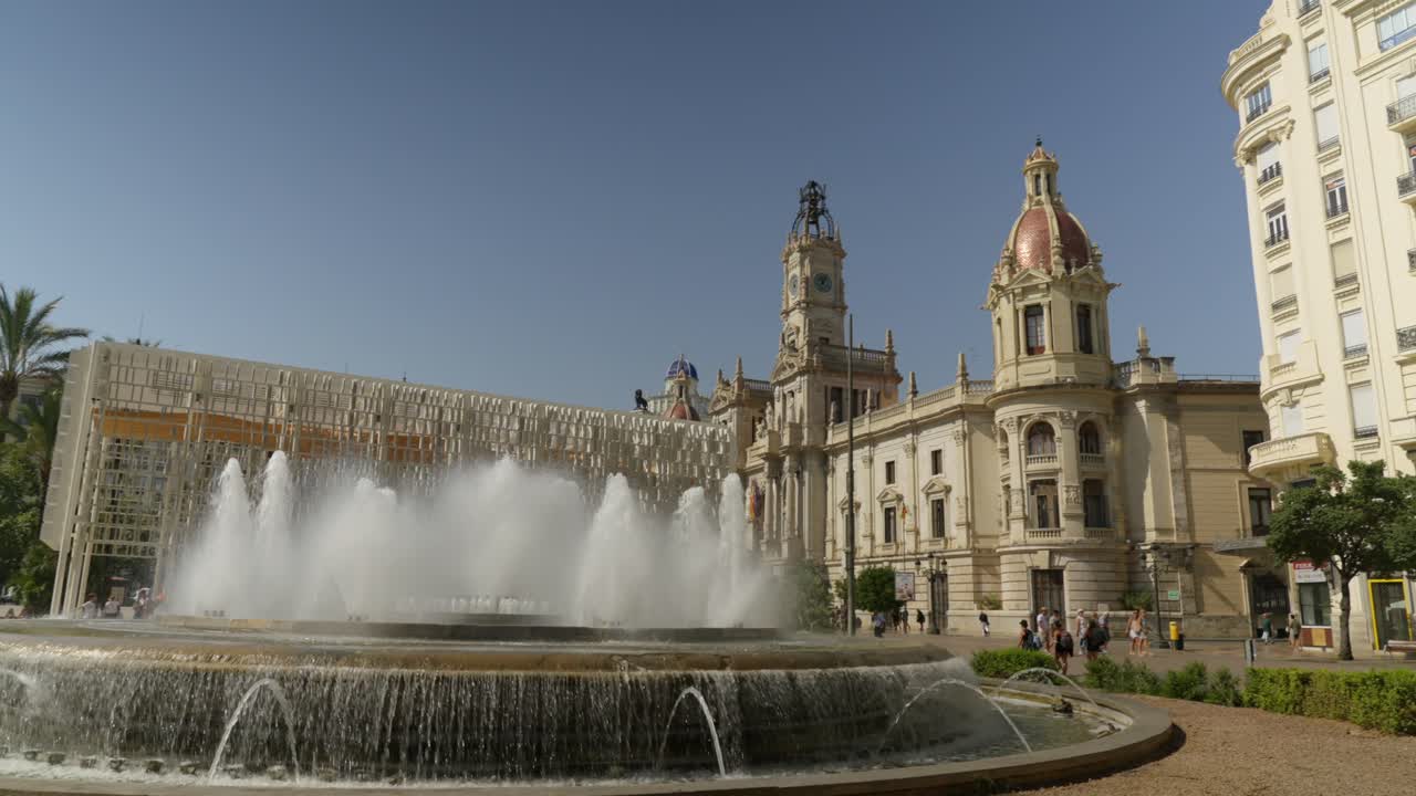 Town hall square fountain in Valencia, Spain at Summer day