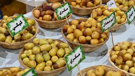 varieties of fresh emirati dates are displayed during the dates festival in the united arab emirates