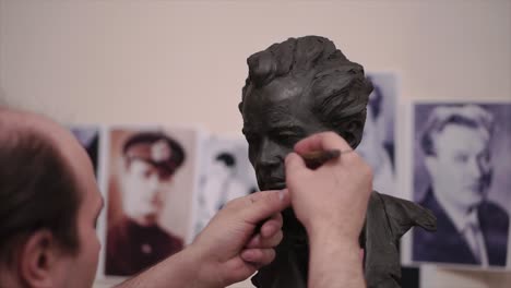 sculpting a clay bust