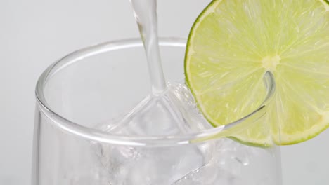 refreshing iced sparkling water with lime