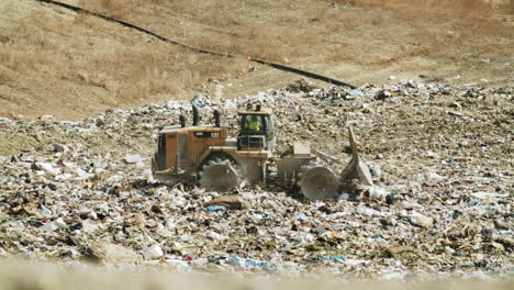 heavy equipment operating in a landfill