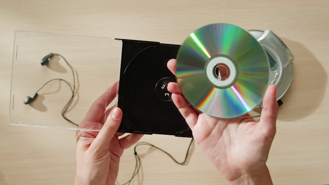Inserting and Removing a CD from a CD Player