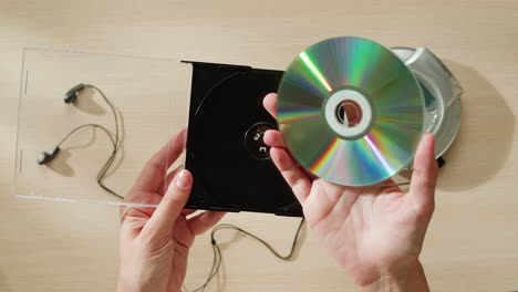 inserting and removing a cd from a cd player