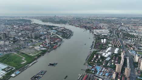 drone aerial view of industrial area with oil tank and factories