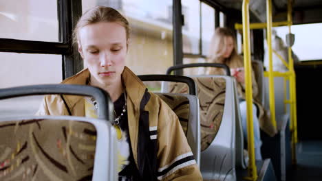 young man in the bus