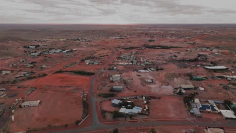 first light aerial over red dirt outback town