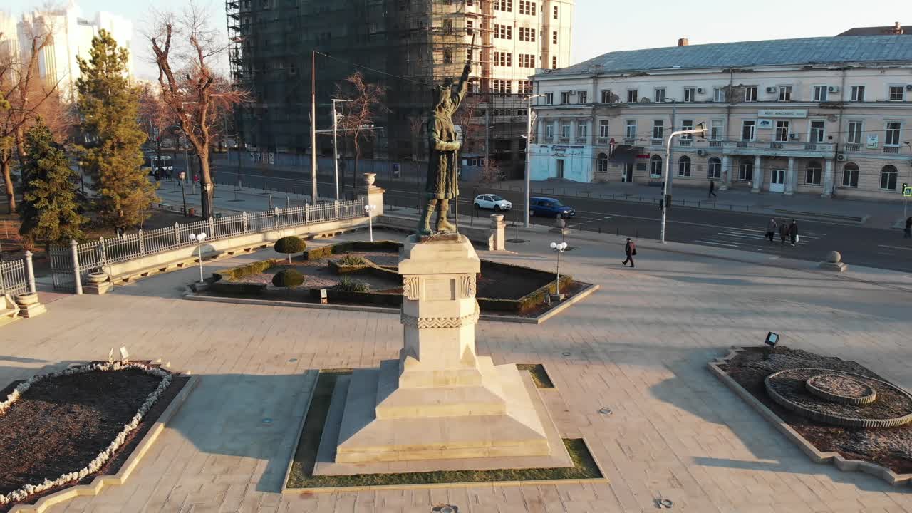 CHISINAU, MOLDOVA - MARCH 19, 2019: Aerial drone shot of Stefan cel Mare statue at sunrise
