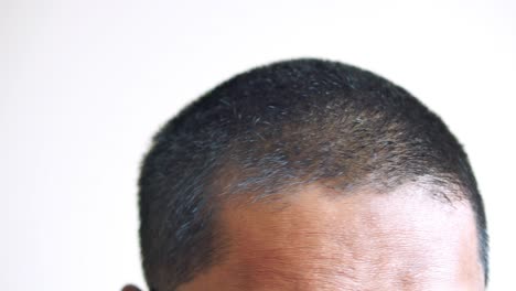 close-up of a man's head and hair