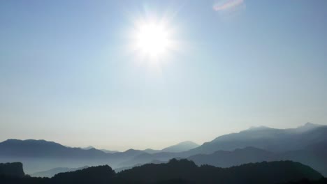 aerial view of mountain in the sun