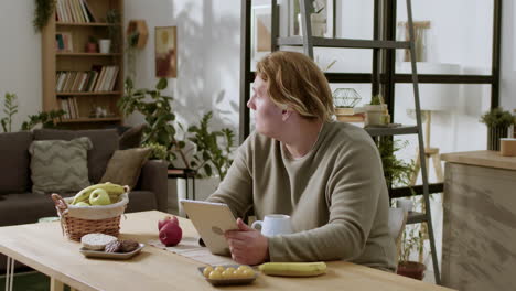 teenager using tablet on the table