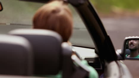 Happy-man-sitting-in-his-car