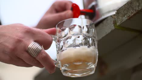 Woman-Pouring-Beer-from-Keg