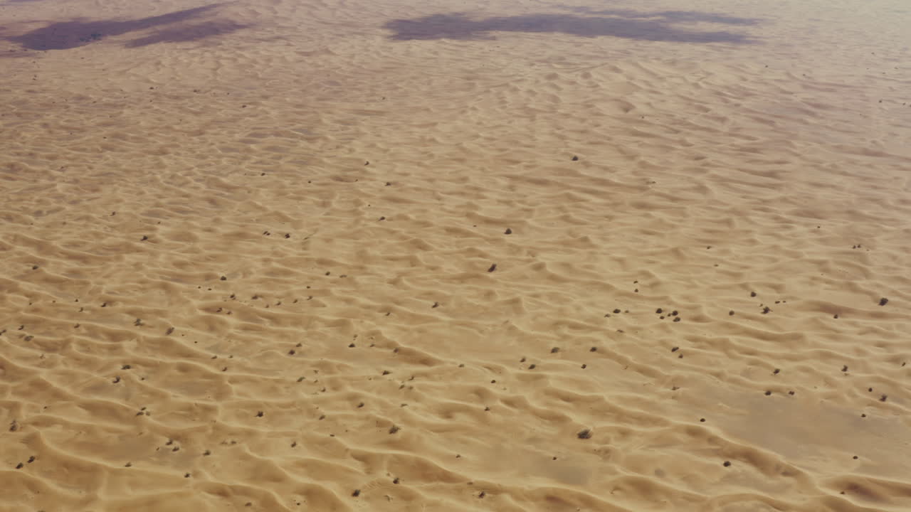 Vast immense desert of Dubai, sand copy space seen from above, Middle East