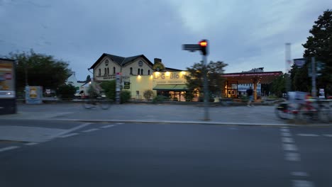 driving through the city at dusk