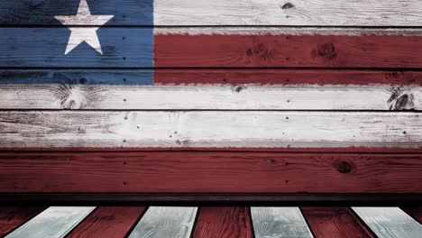 Animation-of-national-flag-of-usa-on-wooden-background