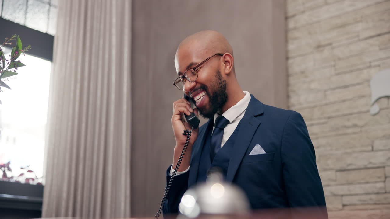 Hotel receptionist on the phone
