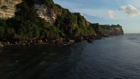 Low-drone-shot-of-cliffs-at-Uluwatu-Bali
