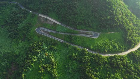 green hills with winding road