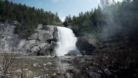 wonderful view of a waterfall and forest in chute neigette rimouski quebec - tilted shot