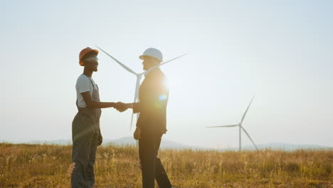 business deal at wind farm