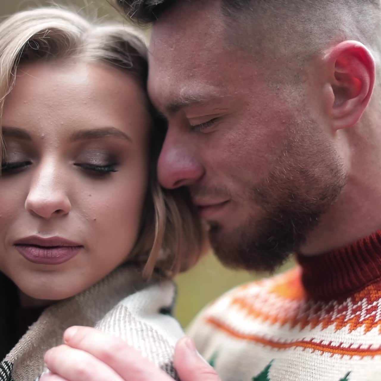 Enamored pair enjoying each other's company during the date. Man and woman having rendezvous at the natural background of countryside