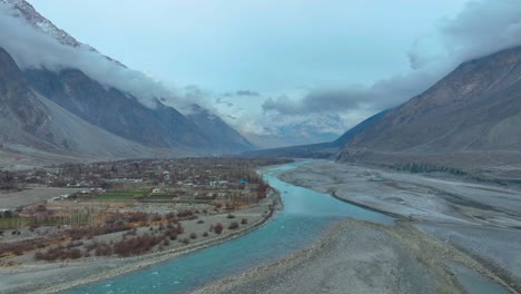 Drone-shot-of-Gilgit-landscape-under-clouds-in-Pakistan