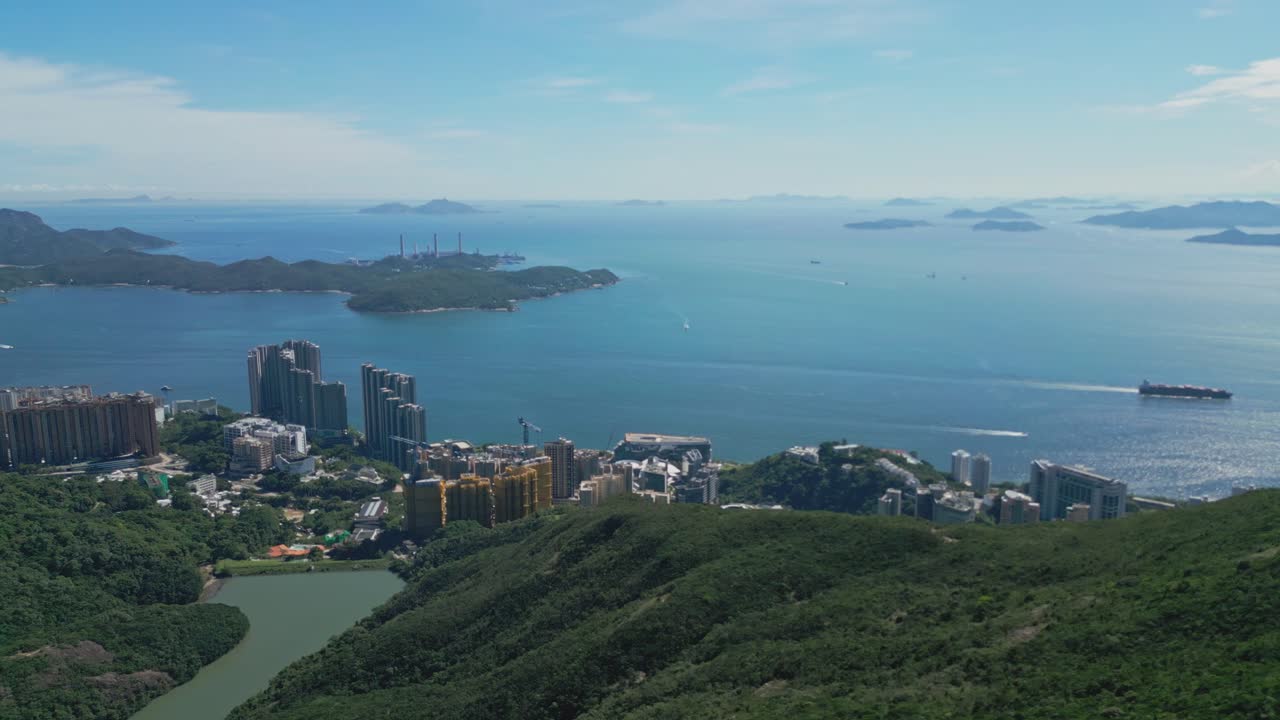 Footage capturing Hong Kong’s mountains meeting the ocean, showcasing scenic coastal hills, greenery, and panoramic sea views, perfect for travel, nature, and outdoor stock visuals