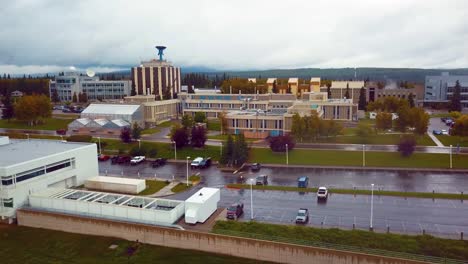 4k drone video of the geophysical institute on the campus of the university of alaska fairbanks, ak during summer day