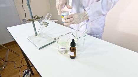 a scientist conducts a chemical reaction using copper carbonate and sulfuric acid in a lab setting with controlled lighting