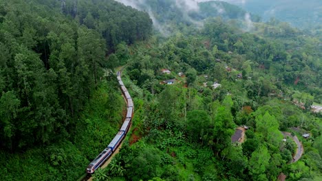 breathtaking aerial drone footage of a train crossing the iconic ella, sri lanka.
